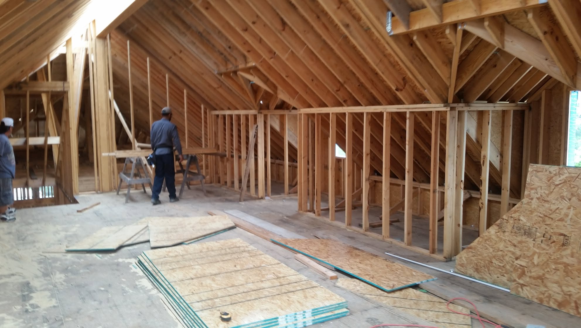 Attic space with framed partition walls and exposed roof rafters